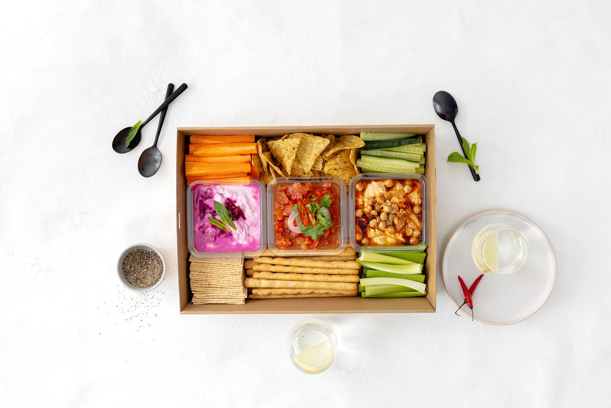 Crudités with Hummus, Persian Feta and Tomato Salsa.