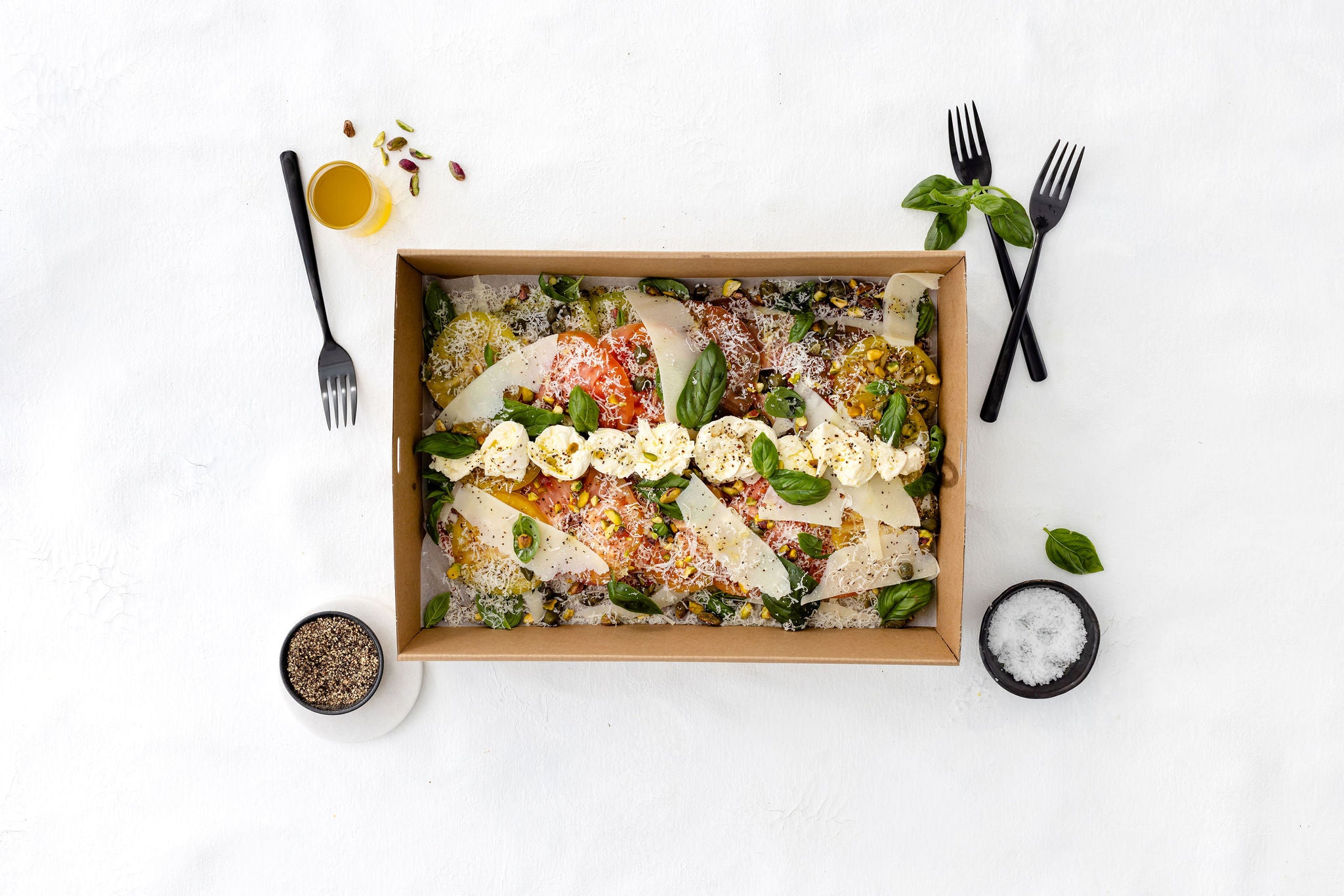 Tomato Carpaccio with Toasted Pistachio, Basil and Boccocini